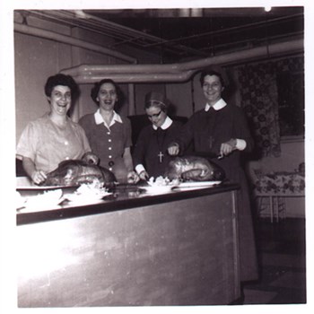 Sister Florence Kelly and friends serving turkey dinner at Pier 21